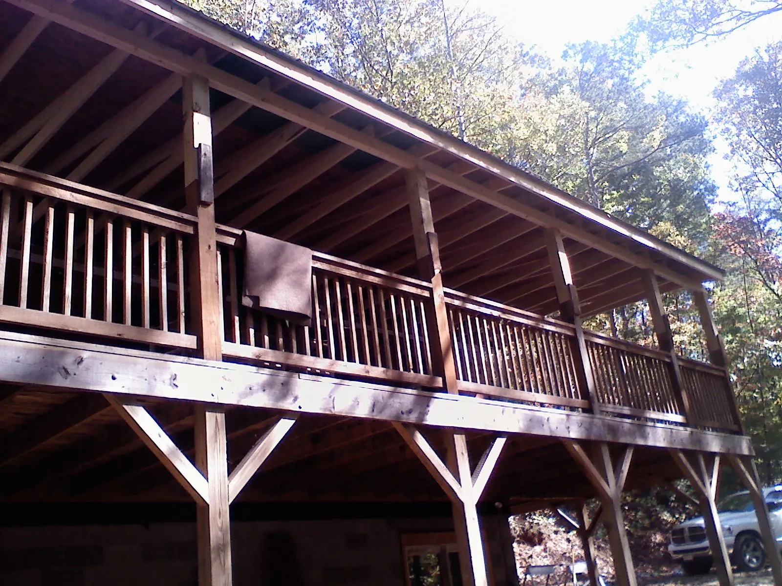 Timber framing under a new elevated porch and deck — Roof Leak Repair in Lapel by Roofing Brothers